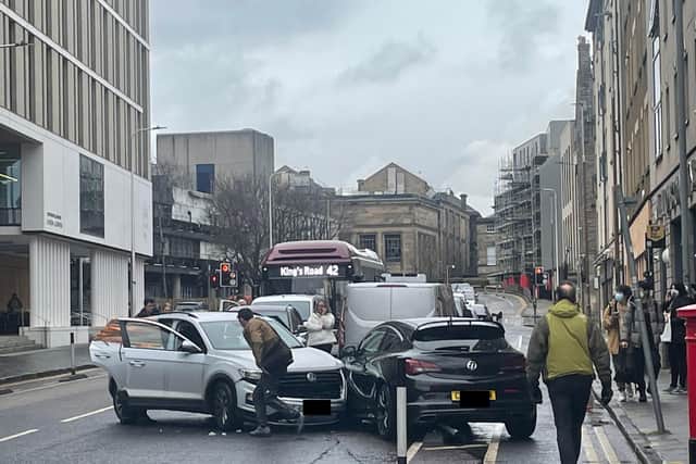Traffic is building on Edinburgh's Potterrow after a car crash