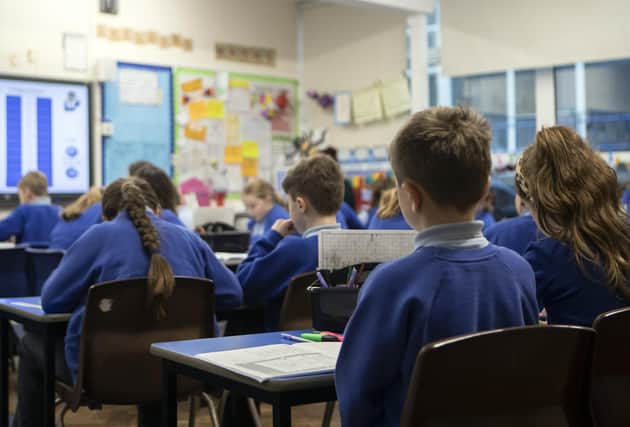 Schools could return a month later than usual and stay open into July, suggests John McLellan (Picture: Danny Lawson/PA)