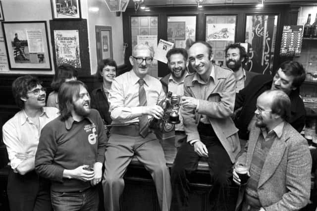 Sandy Bell's in the Seventies - Scotsman features writer Alastair Clarke ( in jacket) is awarded the Sandy Bell's Cup for his services to folk music in October 1979