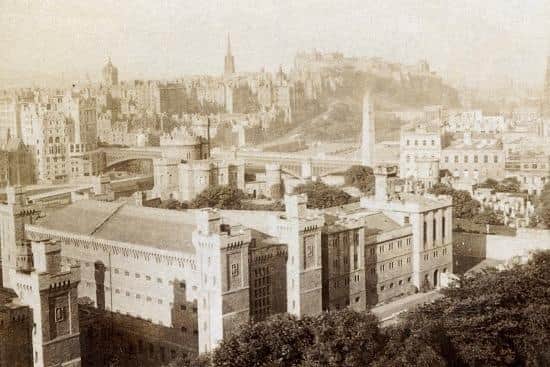 1902. In the foreground is Calton Jail, with Edinburgh Castle and Castle Rock in the distance.