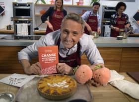 Alex Cole-Hamilton with the Scottish Lib Dem manifesto