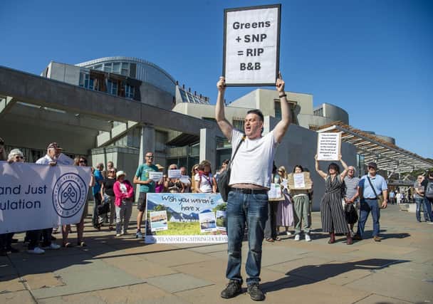 Campaigners protest outside the Holyrood parliament over the Scottish Government's plans to license short-term lets (Picture: Lisa Ferguson)