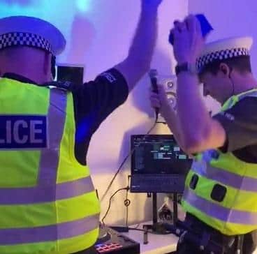 The two officers took to the dancefloor after their message.