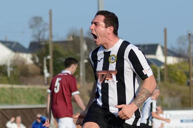 Dean Whitson celebrates one of his two late goals for Dunbar to secure an incredible victory over Linlithgow Rose