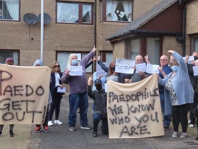 Brian Johnstone contacted an online account which he believed belonged to a 14-year-old child named Sophie and began sending her messages of a sexual nature. Johnstone asked the girl to meet up with him on several occasions and repeatedly asked her to send him indecent images of herself over a two week period in May 2021. But the 61-year-old was snared after it emerged the child’s account was being run by a paedophile hunter group decoy who was attempting to catch online predators. The hunter group confronted Johnstone at his former home in Musselburgh, East Lothian, and the police were soon alerted to the disturbance and he was arrested.
Johnstone, currently of Kingcrave Avenue, Maybole, Ayrshire, was jailed for 163 days and was placed on the Sex Offenders Register for five years. Following his arrest Johnstone was forced to flee the area after angry residents staged several protests outside his flat (pictured) at the town’s Watts Close and at nearby council buildings.
