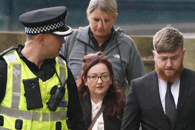 ormer PC Nicole Short (centre) who stands just 5ft 1in tall, was forced to retire after sustaining injuries during the detention of Sheku Bayoh Pic: Andrew Milligan