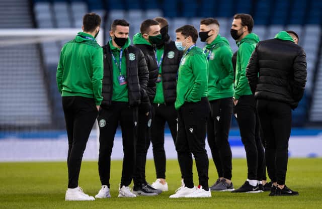 The Hibs players take a look at the Hampden pitch ahead of kick-off
