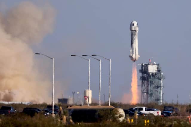 Blue Origin’s New Shepard spacecraft lifts-off from the launch pad with William Shatner and three other civilians on board (Picture: Mario Tama/Getty Images)