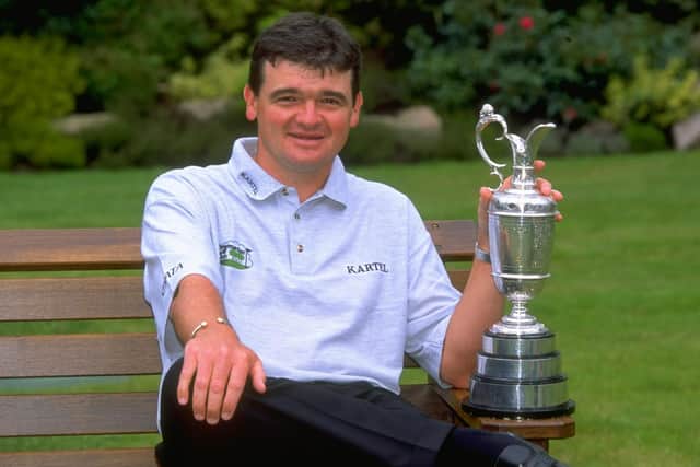 Paul Lawrie with the Claret Jug after winning the 1999 Open at Carnoustie. Picture: Stephen Munday /Allsport