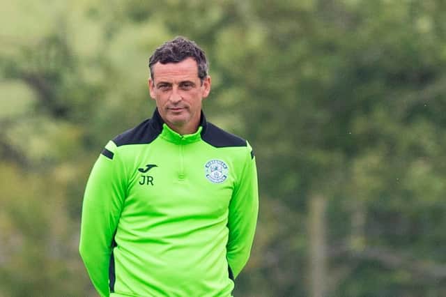 Jack Ross keeps a close eye on training at East Mains ahead of the Europa Conference League qualifier against FC Santa Coloma