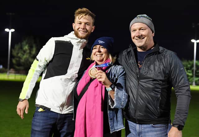Josh Kerr with his mum Jill, and his dad, John, at Saughton Sports Complex. (Picture credit: Gary Leek)