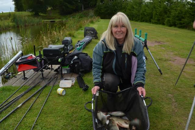 Roz Cassidy, a member of Edinburgh and Lothians Coarse Angling Club, with a winning bag. Picture: Nigel Duncan