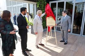 King Charles III and Principal and Vice-Chancellor Heriot-Watt University Dubai Richard Williams unveil a plaque to mark the official opening of the Dubai campus. First Minister Humza Yousaf looks on. Picture: Chris Jackson/Getty Images.