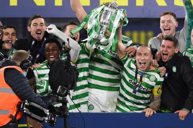 Celtic Captain Scott Brown lifts the 2019/2020 Scottish Cup during the William Hill Scottish Cup Final between Celtic and Hearts at Hampden Park, on December 20, 2020, in Glasgow, Scotland. (Photo by Craig Foy / SNS Group)