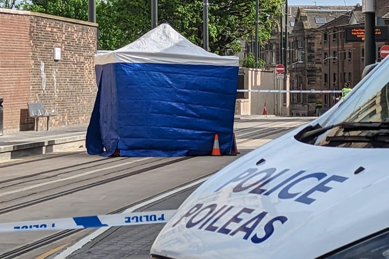 A police tent has been set up at the scene in Constitution Street.