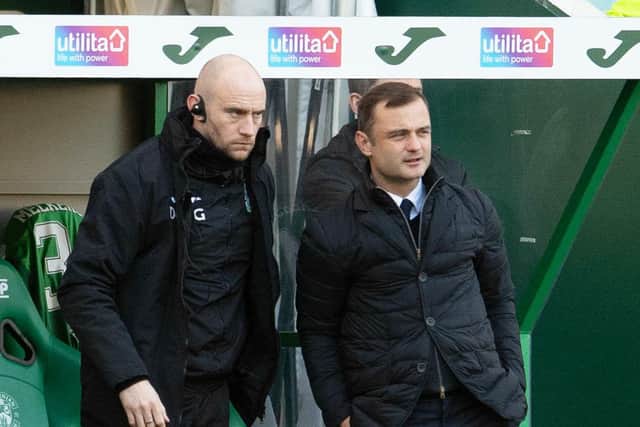 Hibs boss Shaun Maloney and first-team coach David Gray look on during the 2-0 victory over Ross County