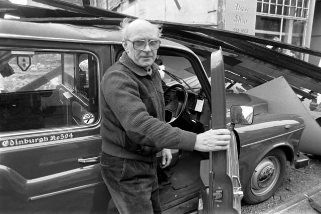 James Duncan accesses his taxi after the Leith Central Station wall collapse in March 1989.