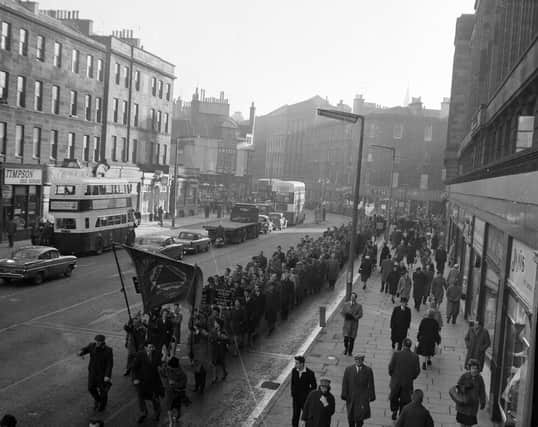 In a very different kind of procession, shipbuilding and engineering unions are pictured marching down Lothian Road during a one day strike in Edinburgh in 1962.