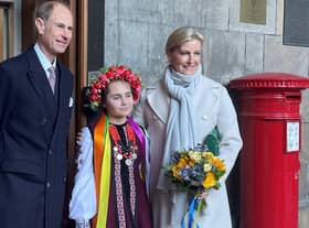 Their Royal Highnesses, The Duke and Duchess of Edinburgh, at the City Chambers reception, pictured with a Ukrainian girl.