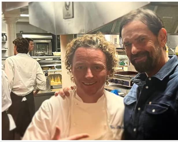 Edinburgh Michelin chef Tom Kitchin, left, is pictured with Outlander actor Duncan Lacroix at his restaurant in Leith. Photo: Tom Kitchin
