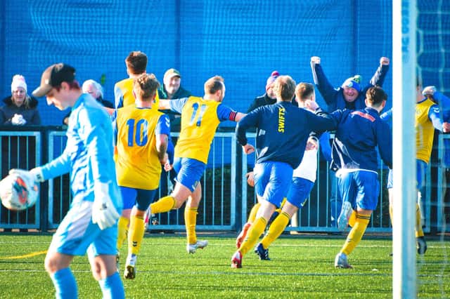 Swifts striker Greig Spence celebrates with teammates. Picture: Swifts FC