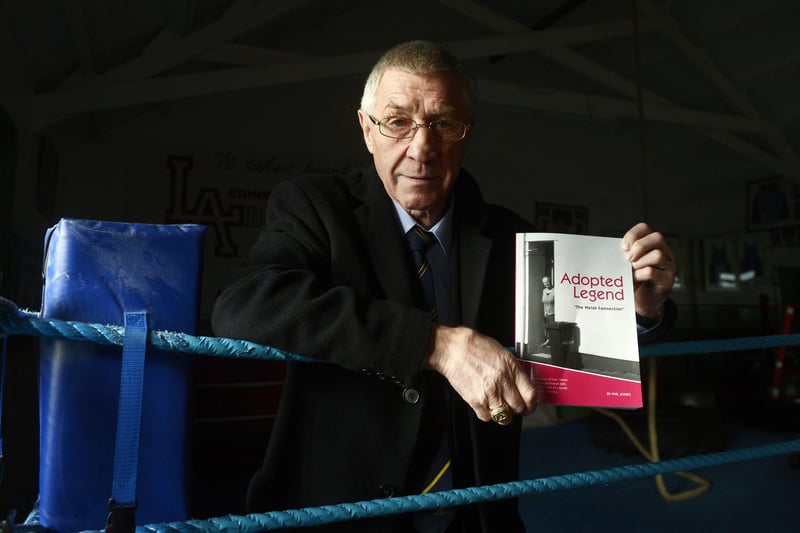 Ken Buchanan with his autobiography, pictured at Lochend Boxing Gym.