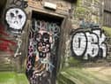 Graffiti in Milne’s Court off Edinburgh's Royal Mile (Picture: Donald Anderson)