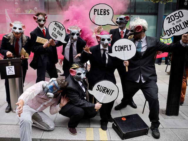 Extinction Rebellion wear rat masks as they protest outside the Department of Business, Energy, Industrial Strategy in central London (Picture: Tolga Akmen/AFP via Getty Images)