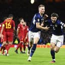 Scott McTominay celebrates with Kieran Tierney after making it 2-0 to Scotland during the European Championships qualifier against Spain. Picture: SNS