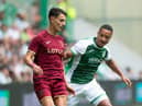 Allan Delferriere in action against Dimitris Giannoulis during the pre-season friendly between Hibs and Norwich City