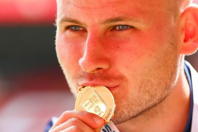 James Scott of Hull City celebrates with his Sky Bet League One winners medal. (Photo by Jacques Feeney/Getty Images)