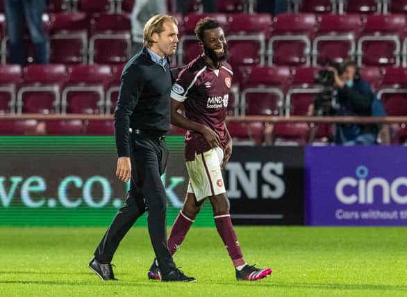 Robbie Neilson and Beni Baningime played huge roles in Hearts' 2-1 defeat of Celtic. (Photo by Ross Parker / SNS Group)