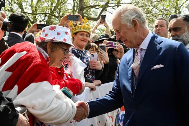 King Charles III on a walkabout outside Buckingham Palace, London, to meet wellwishers ahead of the coronation on Saturday. Photo: Toby Melville/PA Wire