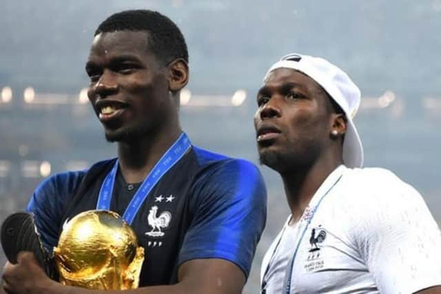 Mathias Pogba, right, joined brother Paul on the pitch to celebrate France's 2018 World Cup win