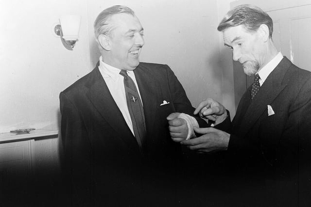 Duncan Macrae and French actor, mime and filmmaker Jacques Tati at a reception at the Edinburgh Film House in 1955.