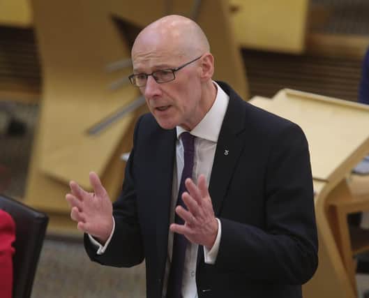 Education Secretary John Swinney initially said 'blended learning' at home and school could last a year, causing uproar (Picture: Pool photograph/Fraser Bremner/Scottish Daily Mail)