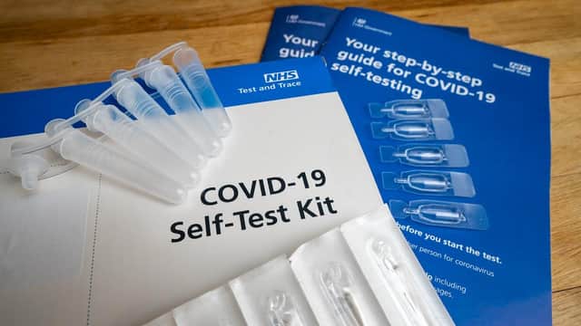 Covid 19 Coronavirus pandemic close up government new variant full home test kit from NHS national health self testing diagnosis with swabs instructions for self isolation