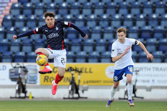 League One returned after a two month break because of lockdown restrictions.  Harry Cochrane (right) was in action for Montrose against Charlie Telfer and Falkirk. Picture: Michael Gillen.