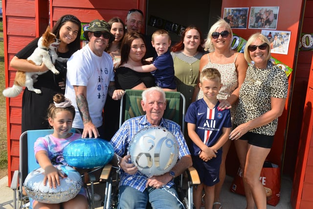 Ken McQuade celebates his 80th birthday at Seaton Carew beach with his family.