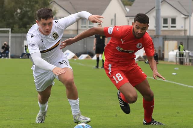 Zach Khan, who did well when he came on for Bonnyrigg, attacks Dumbarton's Michael Garrity. Picture: Joe Gilhooley LRPS