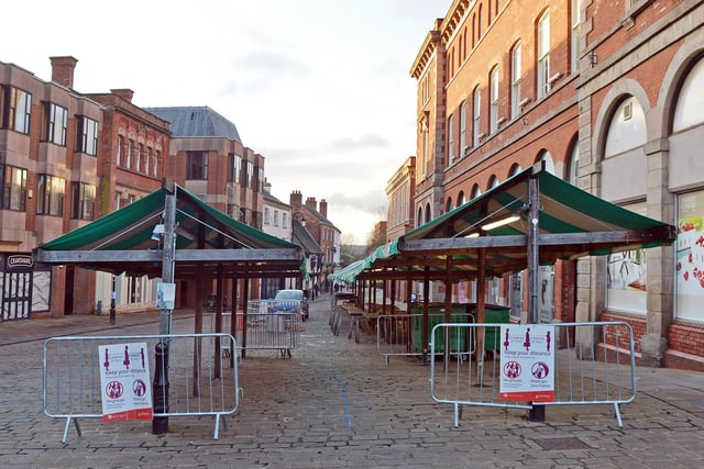 A once bustling market place now stands empty.