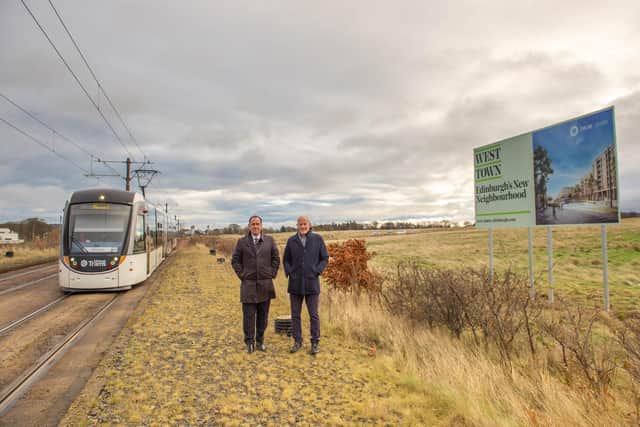 Graeme Bone (L) and Sir Bill Gammell (R) with artistic impression of tram line (picture - Jamie Johnston)