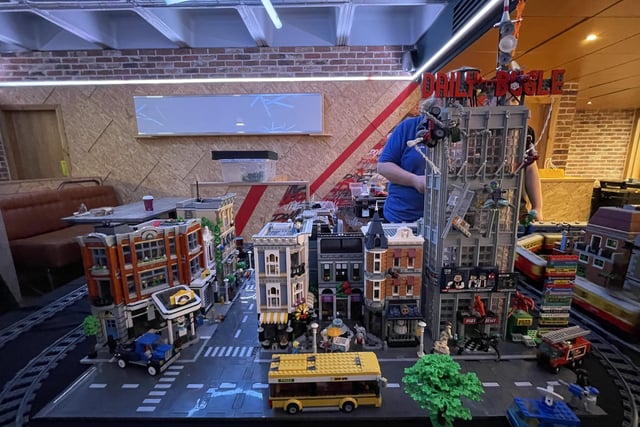 Aaron Rippon's creation depicted a city skyline with a train running around it. He also included scenes, buildings and characters from films such as Ghostbusters, Spiderman and Superman.