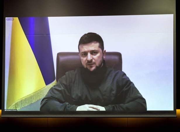 Ukrainian President Volodymyr Zelensky has called on people around the world to come "to your squares, your streets" to stand with Ukraine and against the war on Thursday. Photo by Behrouz Mehri - Getty Images
