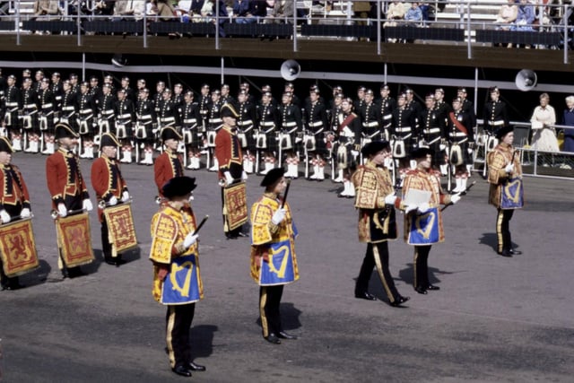 Lord Malcolm Innes, Lord Lyon King of Arms, with his heralds at Edinburgh Castle in August 1983.