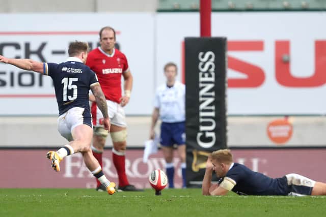 Stuart Hogg kicks a penalty in the last play of the game to seal Scotland's win at Parc y Scarlets, Llanelli.