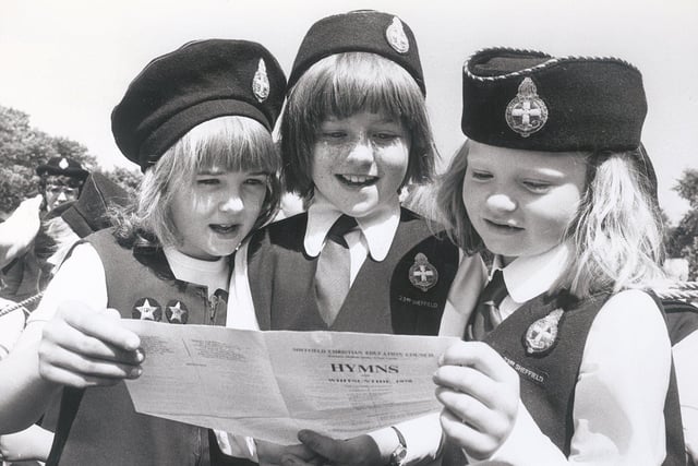 L to R Alison Stead 8, Wendy Burnage 10 and Joanne Frost from the 23rd Wisewood Guides, at the Hillsborough Park Whit Sings, May 1978