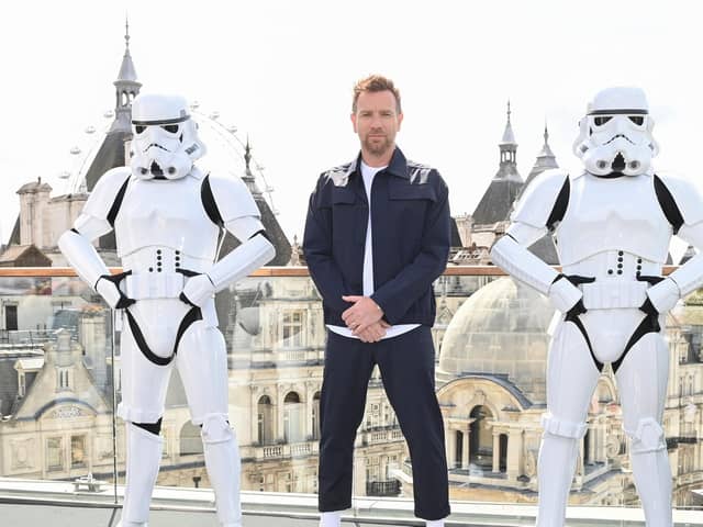 Ewan McGregor poses with Stormtroopers as he attends an "Obi-Wan Kenobi" photocall at the Corinthia Hotel in London. Picture Kate Green/Getty Images