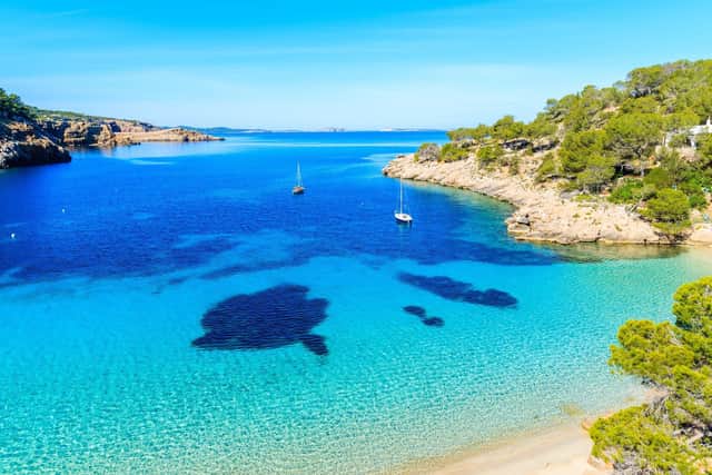 Cala Salanda Bay - one of the stunning beached Ibiza is famous for.