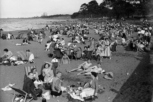 Holidaymakers at Cramond Beach in summer 1955.